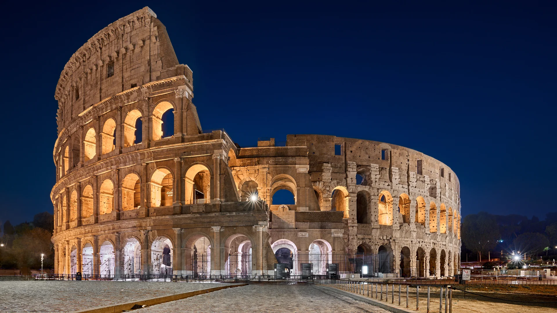 The Colosseum in Rome illuminated at blue hour